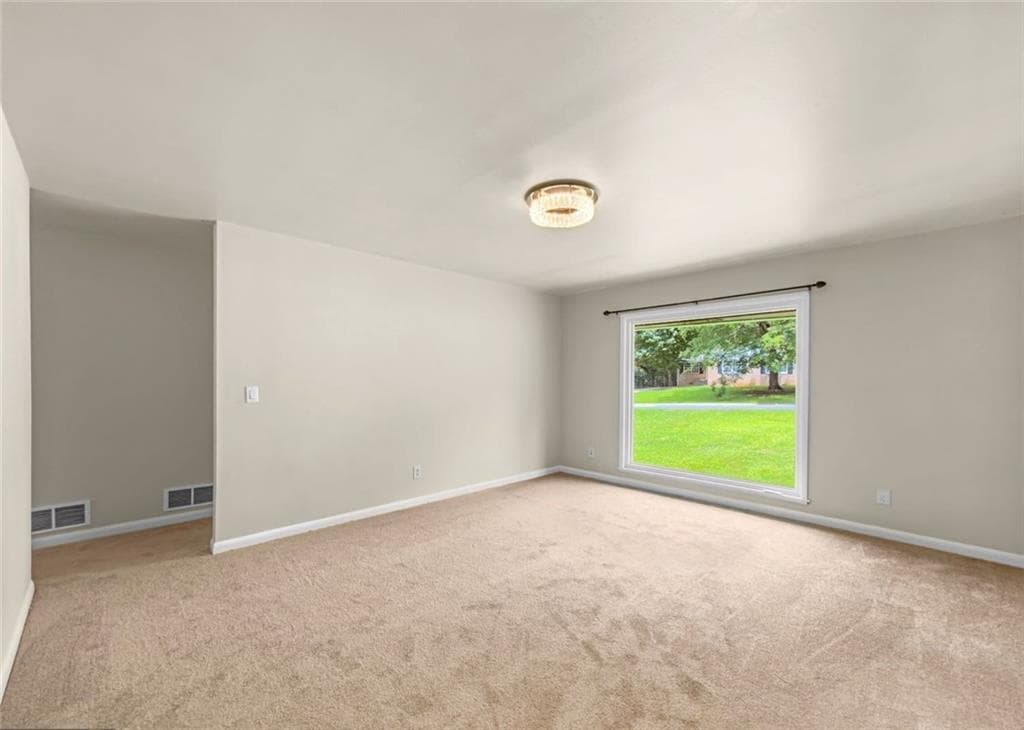 3 bedroom, 2 bathroom, 1,310 sq ft single family residence for sale at 565 Wavelyn Way, Riverdale, GA 30274 — photo 4