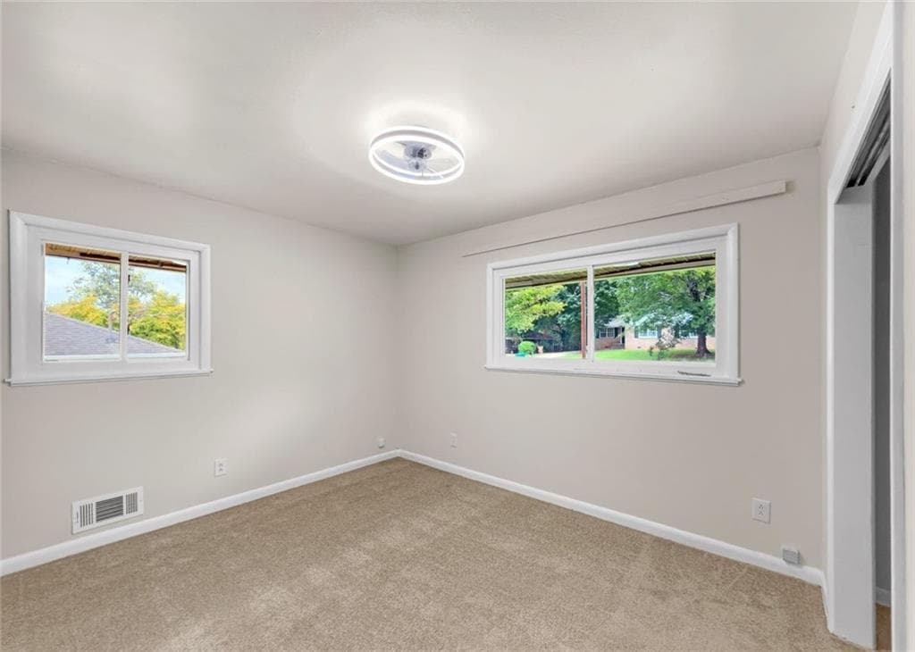 3 bedroom, 2 bathroom, 1,310 sq ft single family residence for sale at 565 Wavelyn Way, Riverdale, GA 30274 — photo 6