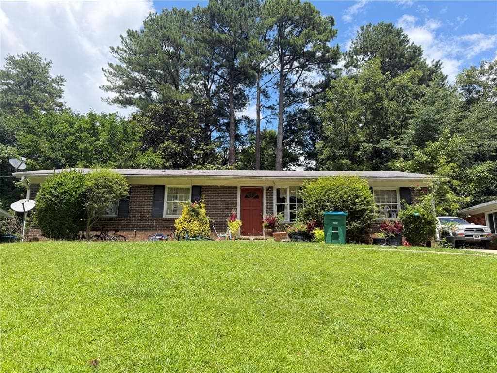 4 bedroom, 2 bathroom, 1,350 sq ft single family residence sold at 3164 Moss Oak Drive, Atlanta, GA 30340