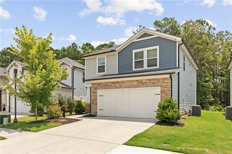 4 bedroom, 3 bathroom, 2,139 sq ft single family residence for rent at 334 Wells Circle, Canton, GA 30114 for $2,400 a month — photo 2