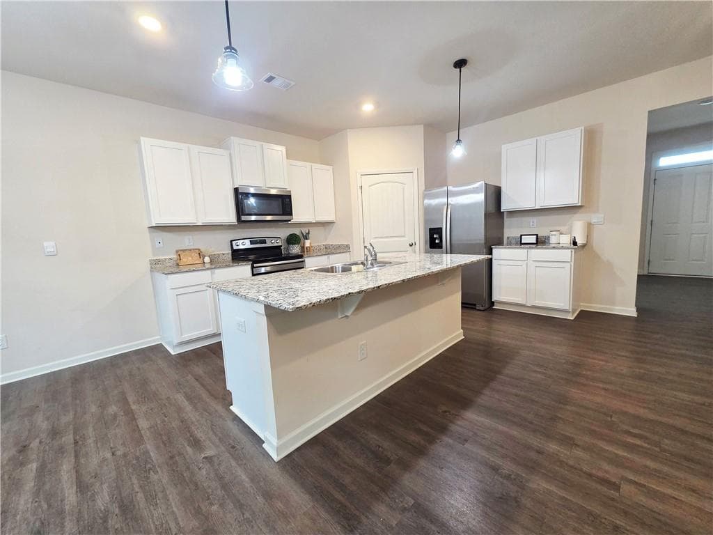 5 bedroom, 3 bathroom, 2,449 sq ft single family residence for sale at 306 Walnut Grove Way, Pendergrass, GA 30567 — photo 6