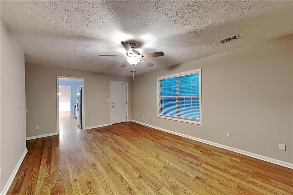 4 bedroom, 3 bathroom, 2,030 sq ft single family residence for rent at 5027 Wesleyan Drive, Woodstock, GA 30189 for $2,275 a month — photo 3