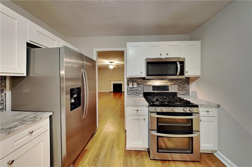 4 bedroom, 3 bathroom, 2,030 sq ft single family residence for rent at 5027 Wesleyan Drive, Woodstock, GA 30189 for $2,275 a month — photo 6