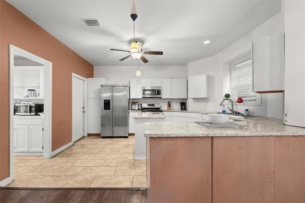 4 bedroom, 3 bathroom, 2,366 sq ft single family residence for sale at 7248 Wheeler Trail, Lithonia, GA 30058 — photo 5