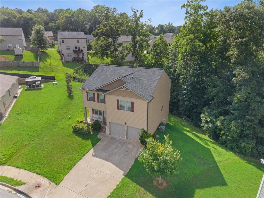 4 bedroom, 3 bathroom, 2,433 sq ft single family residence for sale at 8175 Berrywood Court, Covington, GA 30014 — photo 6