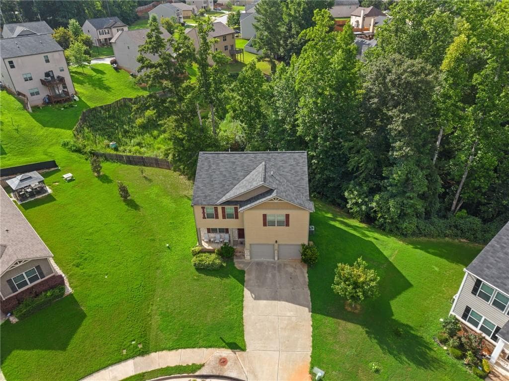 4 bedroom, 3 bathroom, 2,433 sq ft single family residence for sale at 8175 Berrywood Court, Covington, GA 30014 — photo 7