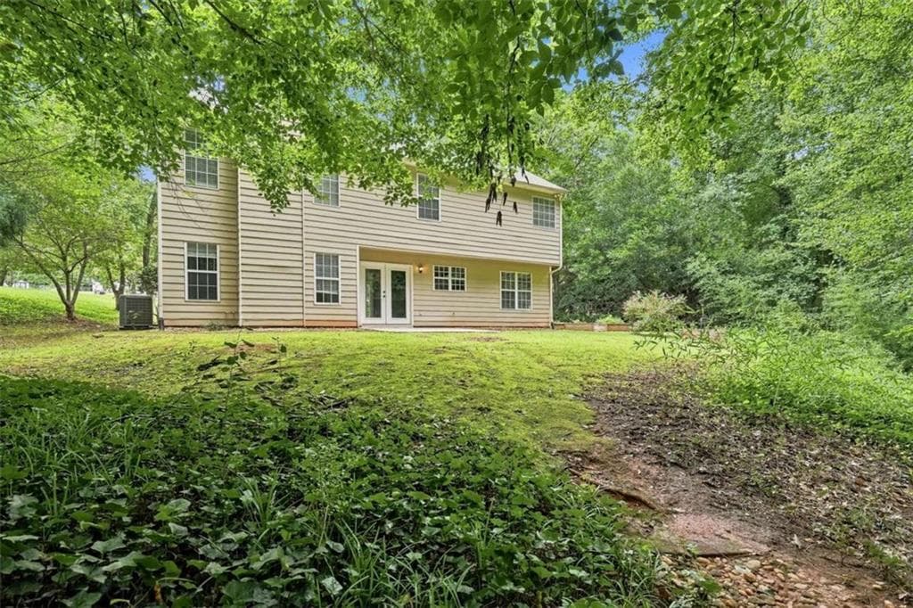 3 bedroom, 3 bathroom, 1,938 sq ft single family residence for sale at 6425 Raleigh Street, Cumming, GA 30040 — photo 3