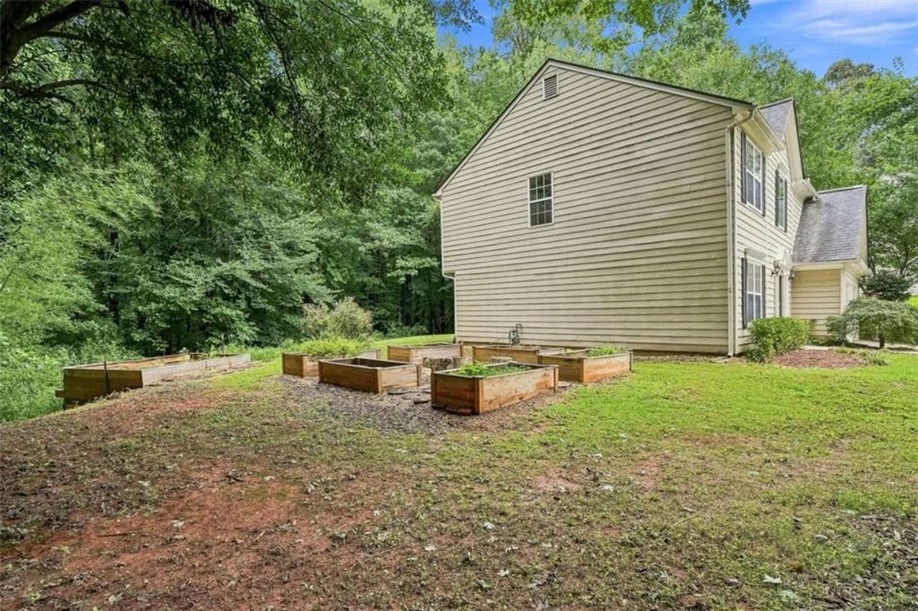 3 bedroom, 3 bathroom, 1,938 sq ft single family residence for sale at 6425 Raleigh Street, Cumming, GA 30040 — photo 7