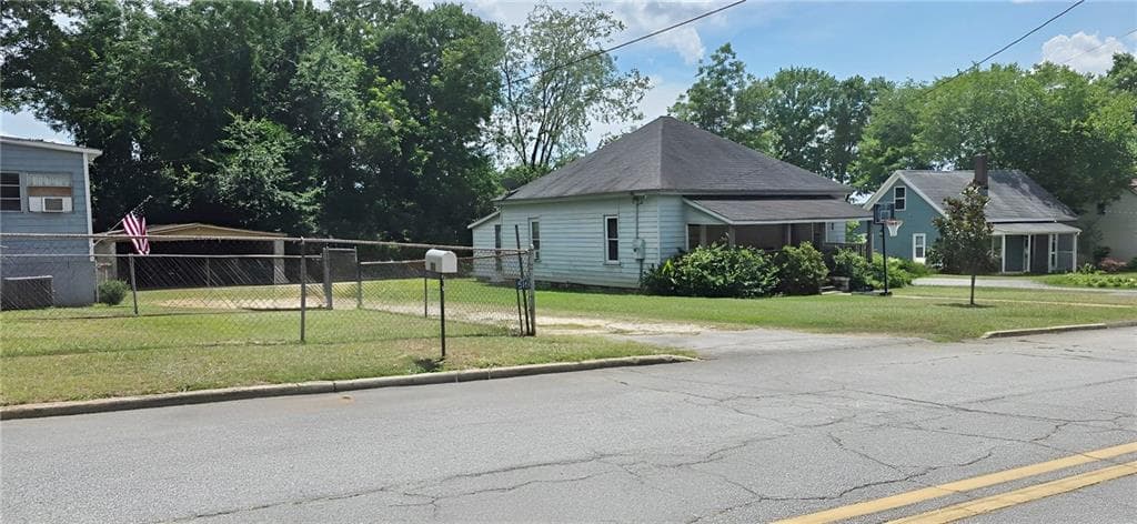 3 bedroom, 1 bathroom, 1,408 sq ft single family residence for sale at 5158 Wheat Street, Covington, GA 30014 — photo 2