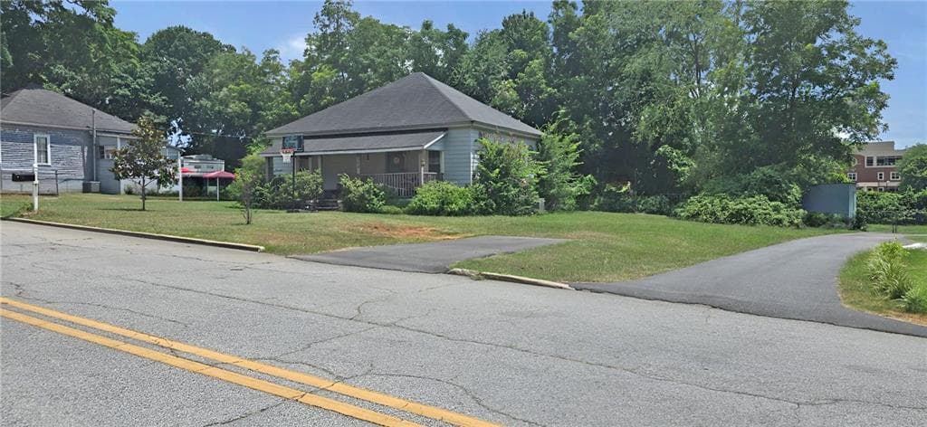 3 bedroom, 1 bathroom, 1,408 sq ft single family residence for sale at 5158 Wheat Street, Covington, GA 30014 — photo 4