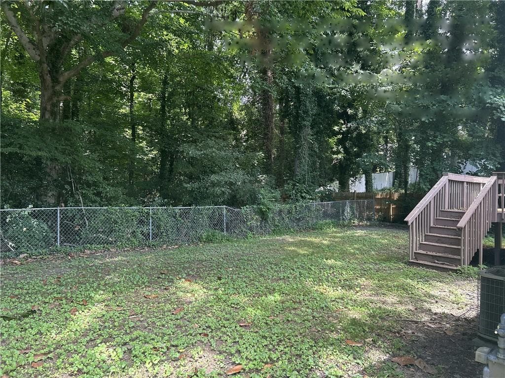 3 bedroom, 2 bathroom, 1,100 sq ft single family residence for sale at 2740 Santa Barbara Drive, Atlanta, GA 30318 — photo 5