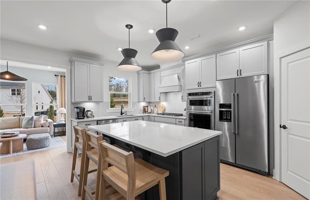 5 bedroom, 4 bathroom, 4,512 sq ft single family residence for sale at 4635 Rosarian Drive, Cumming, GA 30040 — photo 4