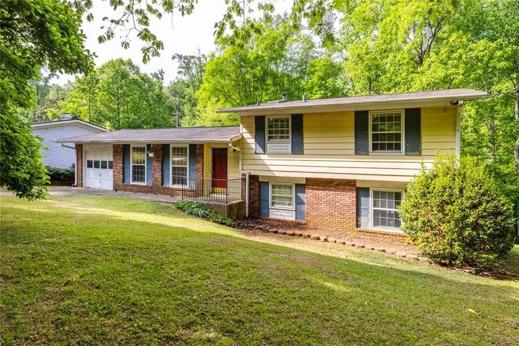4 bedroom, 2 bathroom, 2,009 sq ft single family residence sold at 1569 Bubbling Creek Road, Brookhaven, GA 30319
