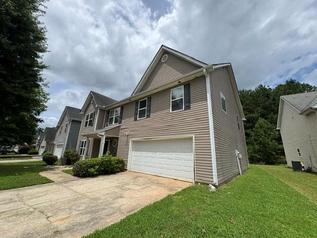 4 bedroom, 2 bathroom, 3,002 sq ft single family residence for sale at 3159 Meadow Point Drive, Snellville, GA 30039 — photo 2