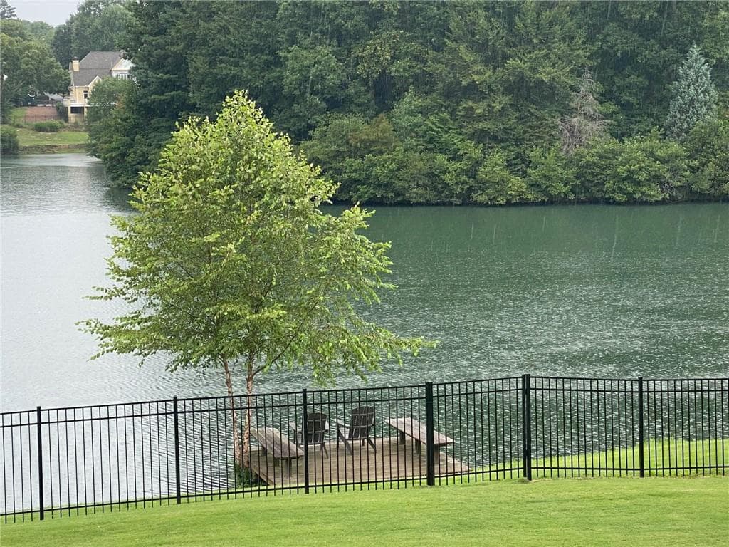 6 bedroom, 8 bathroom, 6,847 sq ft single family residence for sale at 665 Falls Lake Drive, Johns Creek, GA 30022 — photo 2