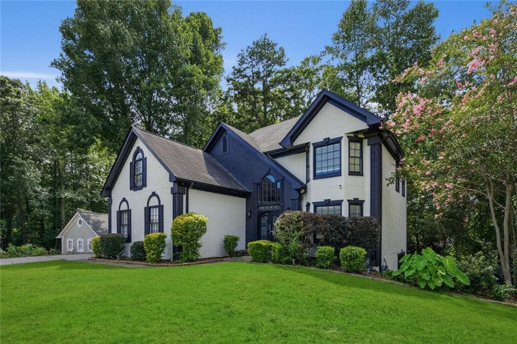 5 bedroom, 4 bathroom, 3,674 sq ft single family residence for sale at 1460 Midland Way, Lawrenceville, GA 30043 — photo 2