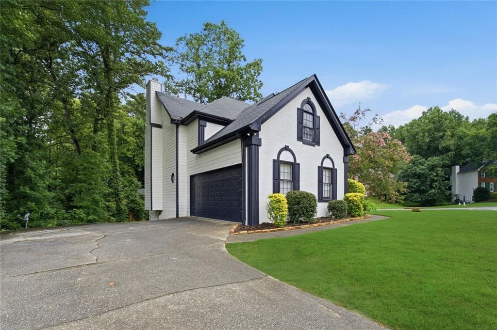 5 bedroom, 4 bathroom, 3,674 sq ft single family residence for sale at 1460 Midland Way, Lawrenceville, GA 30043 — photo 4