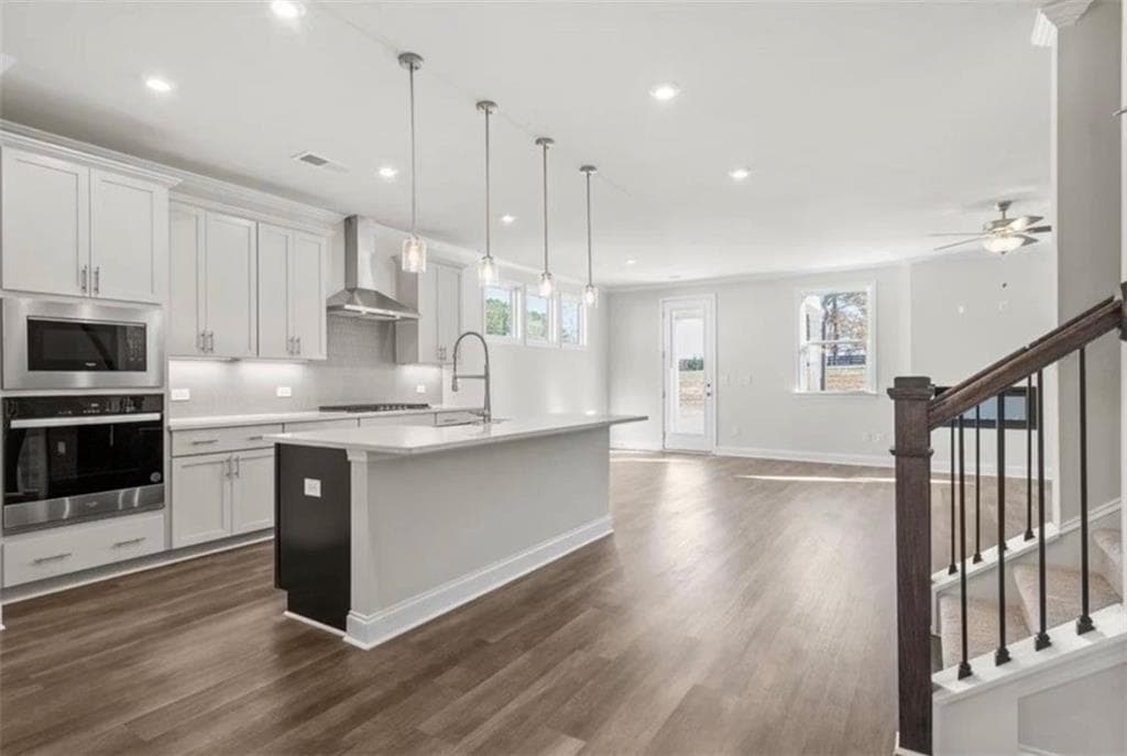 4 bedroom, 4 bathroom, 2,486 sq ft single family residence for sale at 551 Grand Wehunt Drive, Hoschton, GA 30548 — photo 7