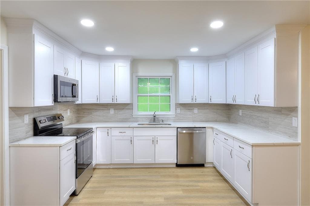 4 bedroom, 4 bathroom, 3,132 sq ft single family residence for sale at 66 Lockring Drive, Lilburn, GA 30047 — photo 6