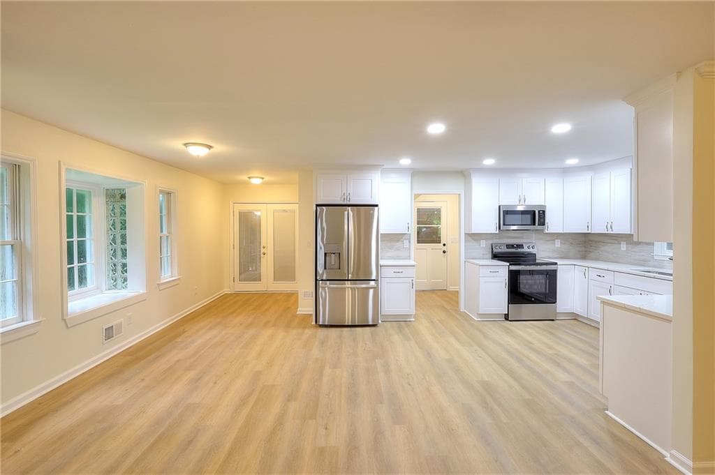 4 bedroom, 4 bathroom, 3,132 sq ft single family residence for sale at 66 Lockring Drive, Lilburn, GA 30047 — photo 7