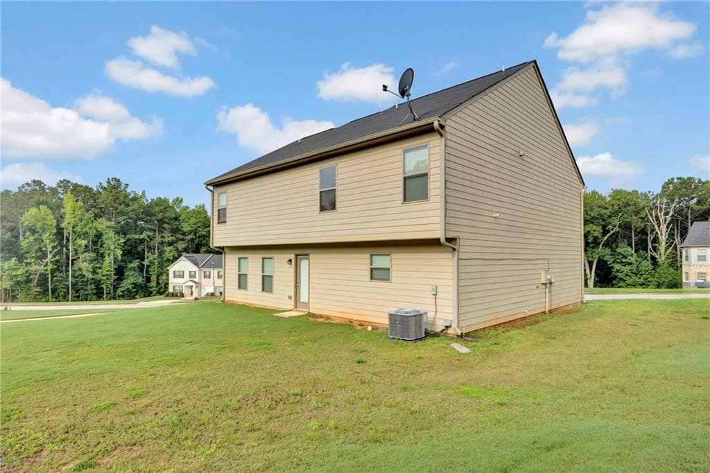 4 bedroom, 3 bathroom, 2,349 sq ft single family residence for sale at 145 Chapel Heights Way, Covington, GA 30016 — photo 3