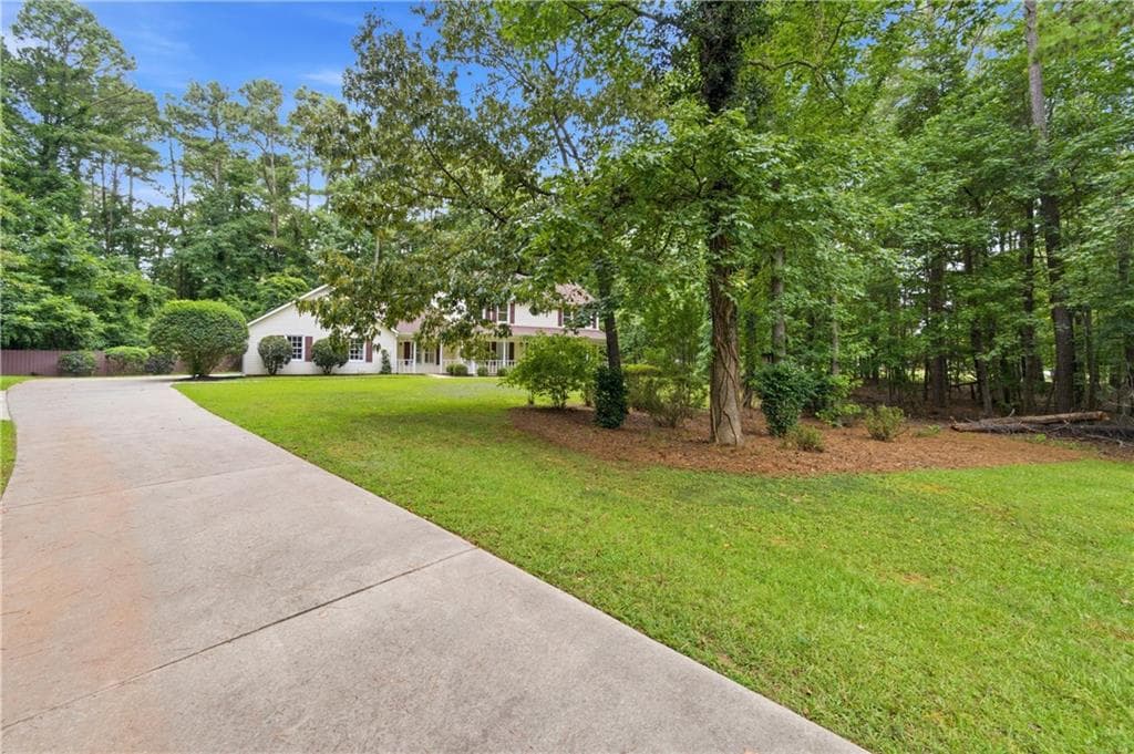 4 bedroom, 3 bathroom, 2,168 sq ft single family residence for sale at 175 Old Mill, Fayetteville, GA 30214 — photo 2