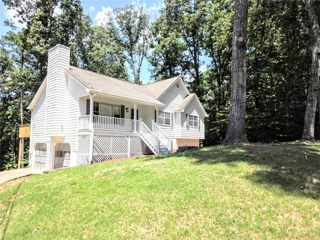 4 bedroom, 2 bathroom, 1,328 sq ft single family residence for sale at 1436 Towne Harbor Lane, Woodstock, GA 30189