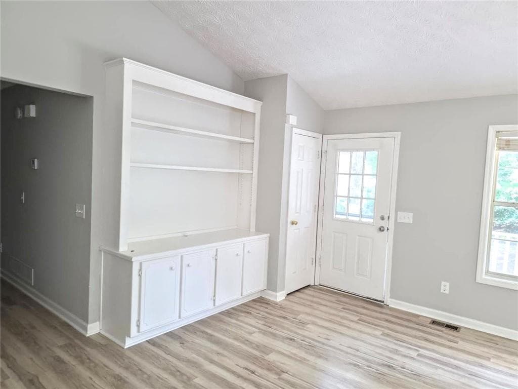 4 bedroom, 2 bathroom, 1,328 sq ft single family residence for sale at 1436 Towne Harbor Lane, Woodstock, GA 30189 — photo 3