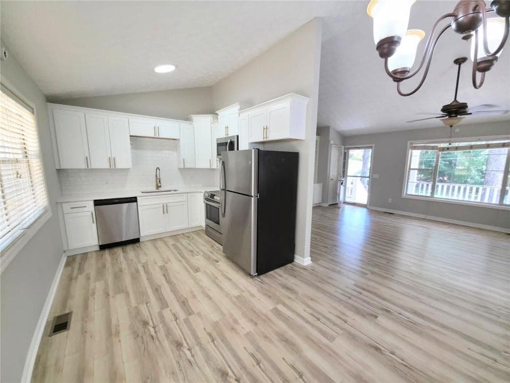 4 bedroom, 2 bathroom, 1,328 sq ft single family residence for sale at 1436 Towne Harbor Lane, Woodstock, GA 30189 — photo 8