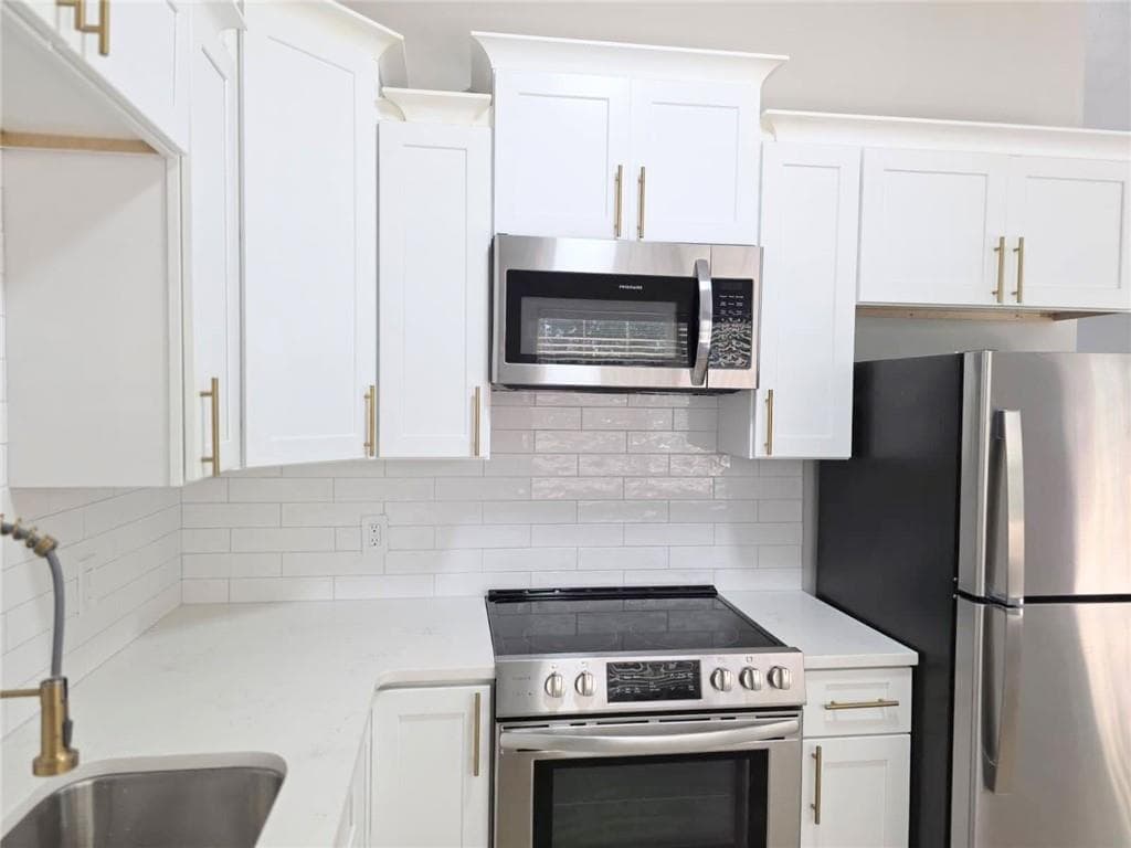 4 bedroom, 2 bathroom, 1,328 sq ft single family residence for sale at 1436 Towne Harbor Lane, Woodstock, GA 30189 — photo 10