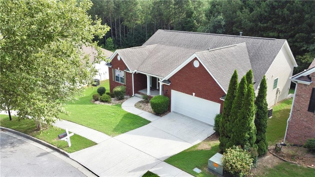 5 bedroom, 3 bathroom, 3,660 sq ft single family residence for sale at 4081 Savannah Ridge Trace, Loganville, GA 30052 — photo 2