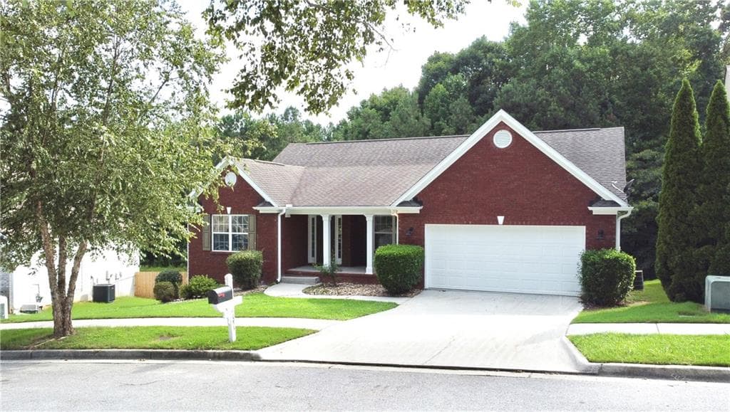 5 bedroom, 3 bathroom, 3,660 sq ft single family residence for sale at 4081 Savannah Ridge Trace, Loganville, GA 30052 — photo 3