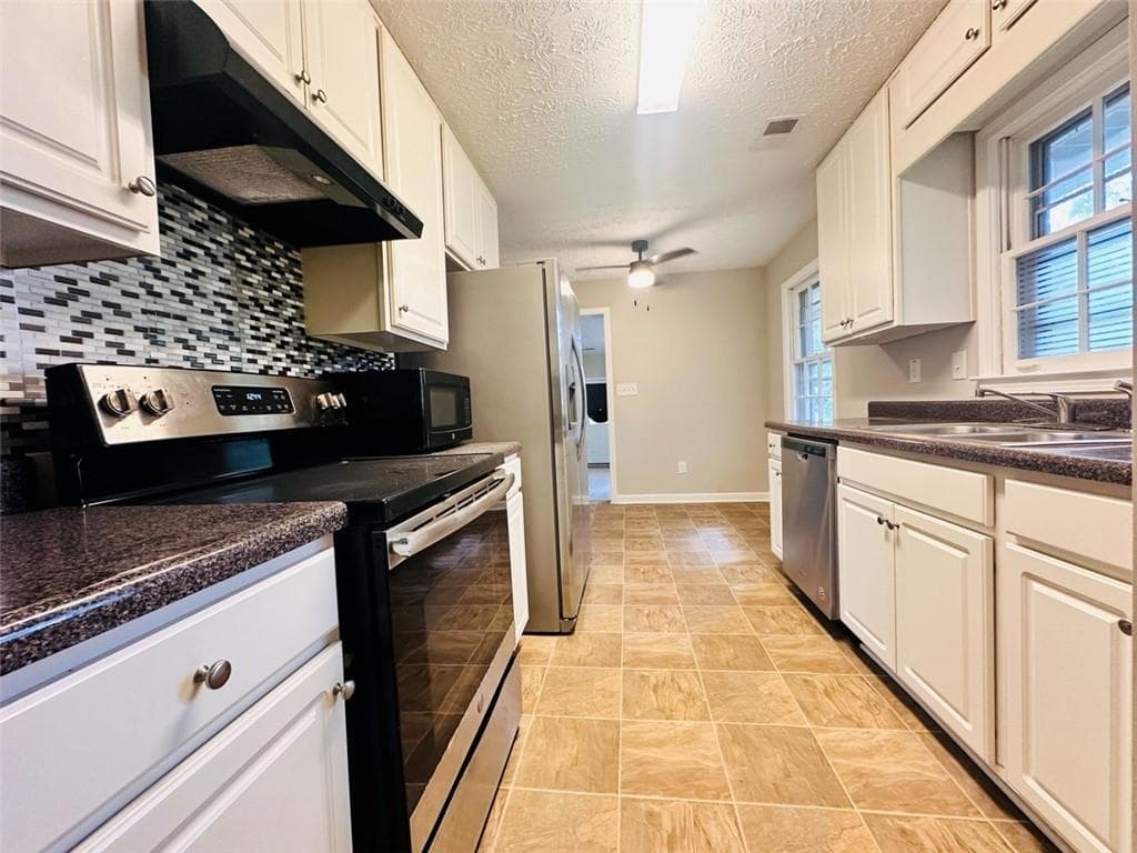 3 bedroom, 2 bathroom, 1,516 sq ft single family residence for rent at 6150 Mallory Road, Atlanta, GA 30349 for $1,595 a month — photo 4