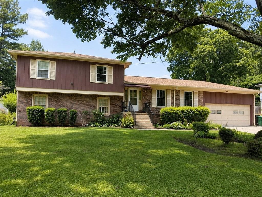 4 bedroom, 3 bathroom, 1,679 sq ft single family residence for sale at 741 Corundum Court, Stone Mountain, GA 30083