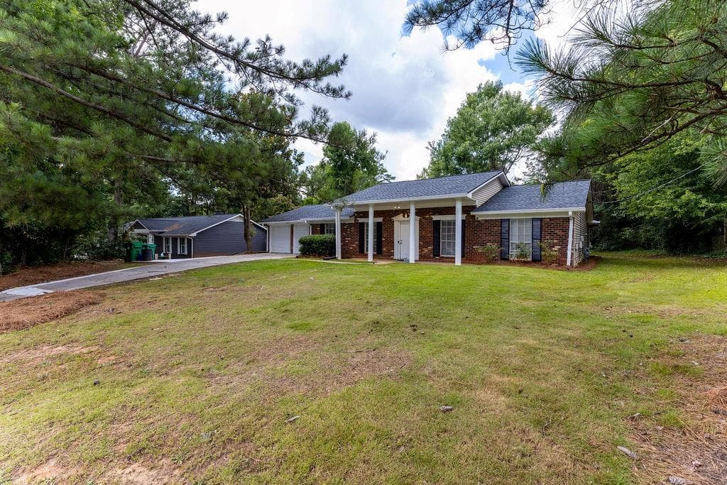 3 bedroom, 2 bathroom, 1,724 sq ft single family residence for sale at 2053 Wellborn Road, Lithonia, GA 30058 — photo 2