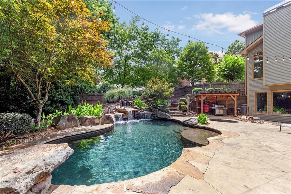 5 bedroom, 5 bathroom, 6,064 sq ft single family residence for sale at 2318 Reubens Run, Marietta, GA 30064 — photo 2