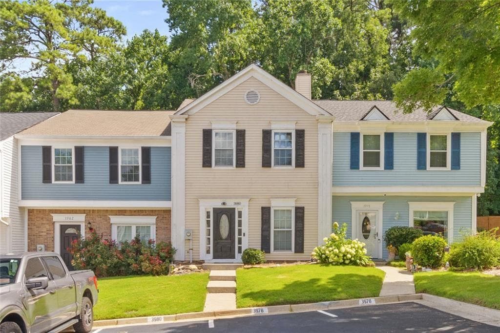 2 bedroom, 3 bathroom, 1,160 sq ft townhouse for sale at 3980 Hancock Circle, Atlanta, GA 30340 — photo 1 of 26