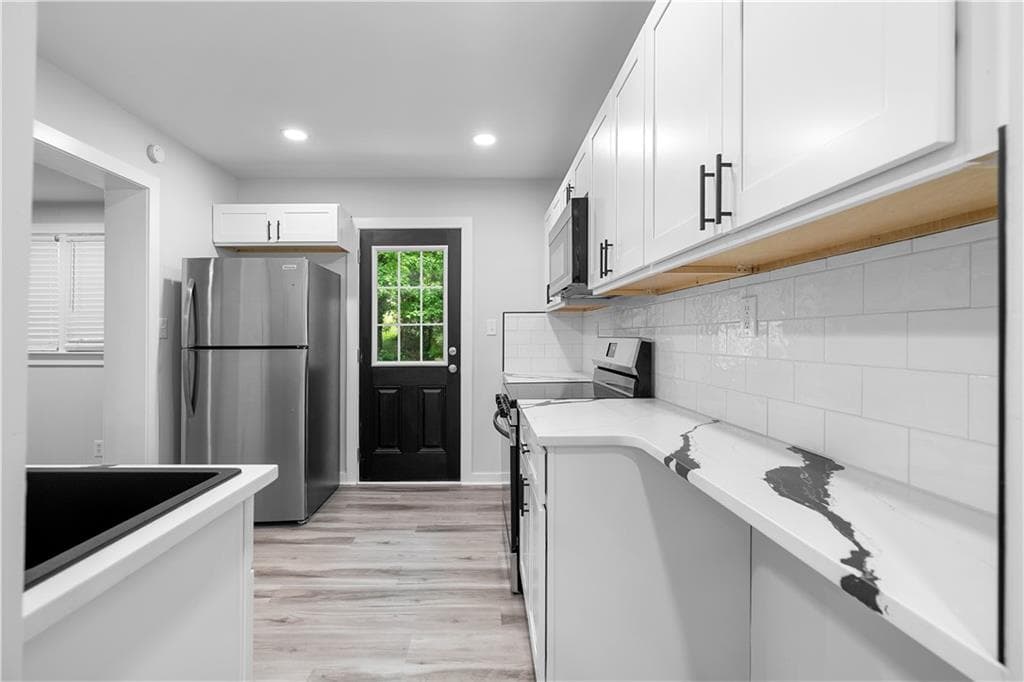 5 bedroom, 3 bathroom, 2,015 sq ft single family residence for sale at 2860 Reveille Circle, Atlanta, GA 30316 — photo 8