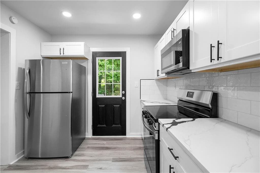 5 bedroom, 3 bathroom, 2,015 sq ft single family residence for sale at 2860 Reveille Circle, Atlanta, GA 30316 — photo 9