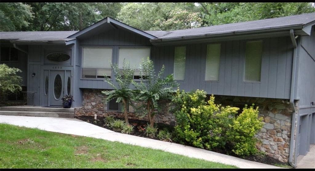 5 bedroom, 3 bathroom, 3,880 sq ft single family residence for sale at 4693 Rivercliff Drive, Lilburn, GA 30047 — photo 2