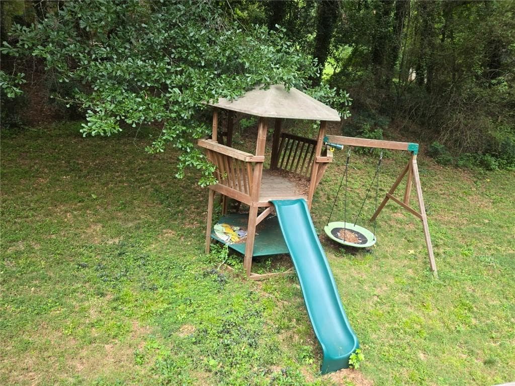 5 bedroom, 3 bathroom, 3,880 sq ft single family residence for sale at 4693 Rivercliff Drive, Lilburn, GA 30047 — photo 4