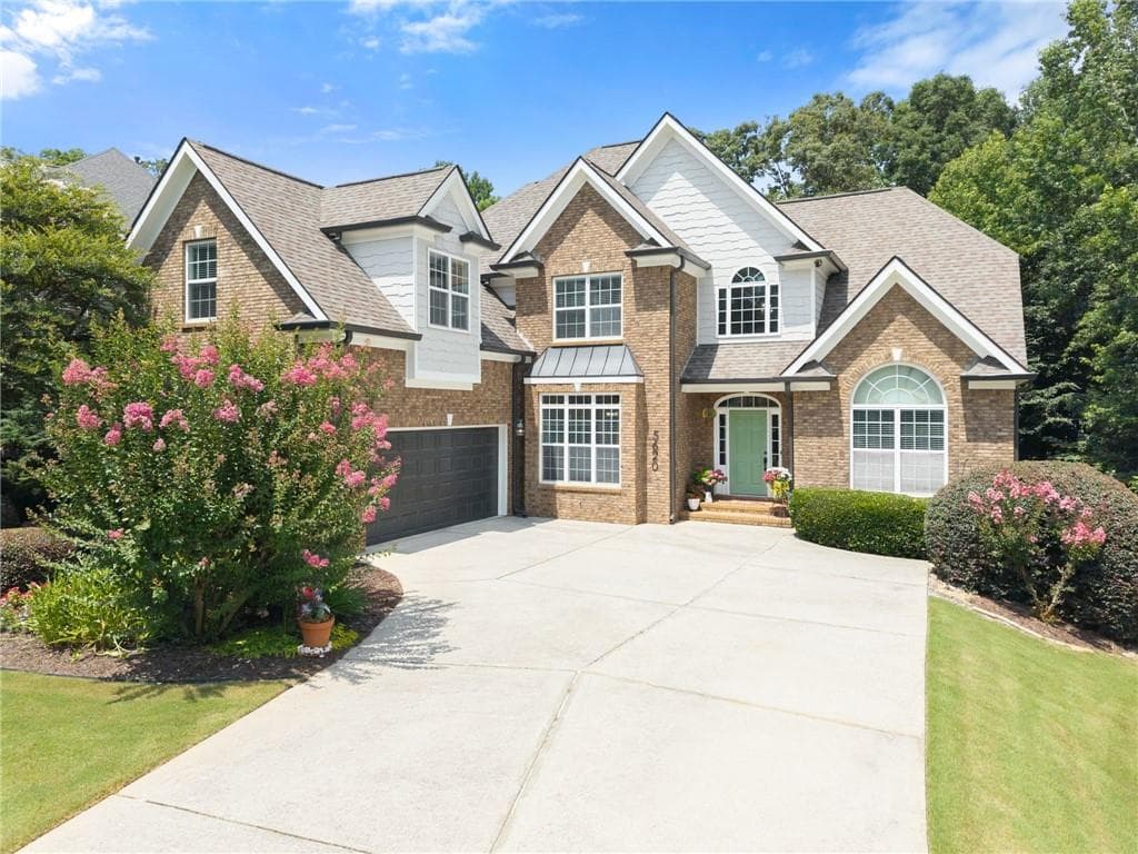 4 bedroom, 6 bathroom, 3,718 sq ft single family residence for sale at 5620 Battle Ridge Drive, Flowery Branch, GA 30542