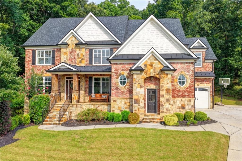 6 bedroom, 5 bathroom, 4,935 sq ft single family residence for sale at 1349 Woodtrace Lane, Auburn, GA 30011