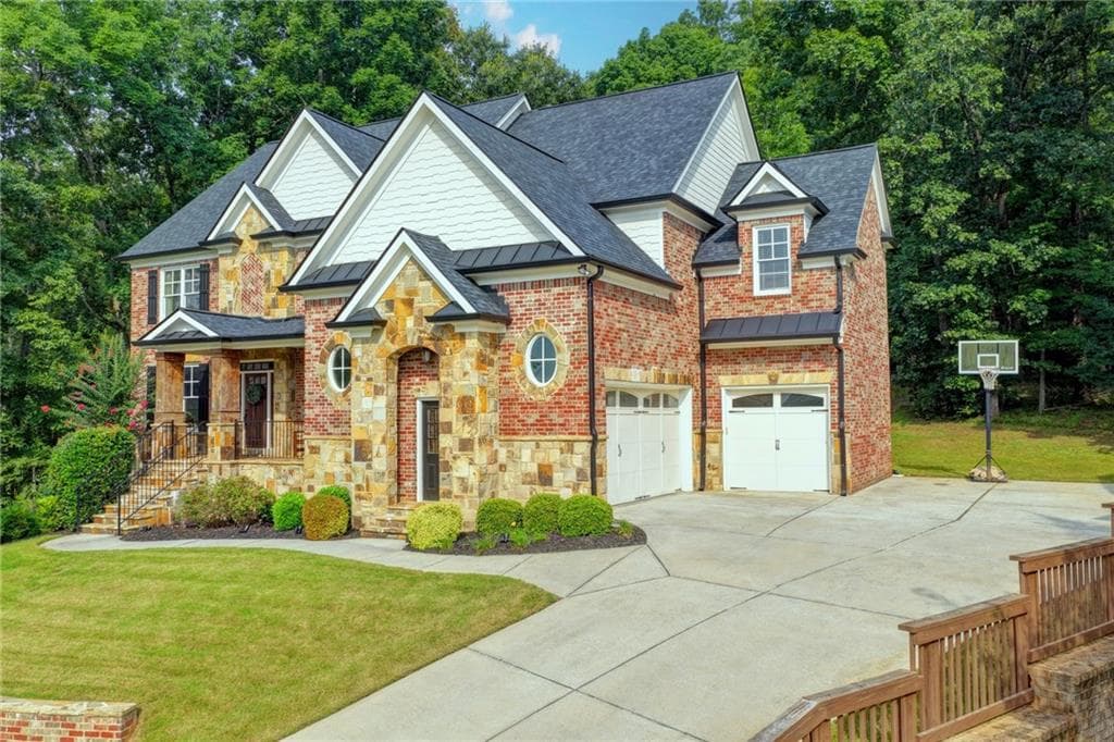 6 bedroom, 5 bathroom, 4,935 sq ft single family residence for sale at 1349 Woodtrace Lane, Auburn, GA 30011 — photo 2