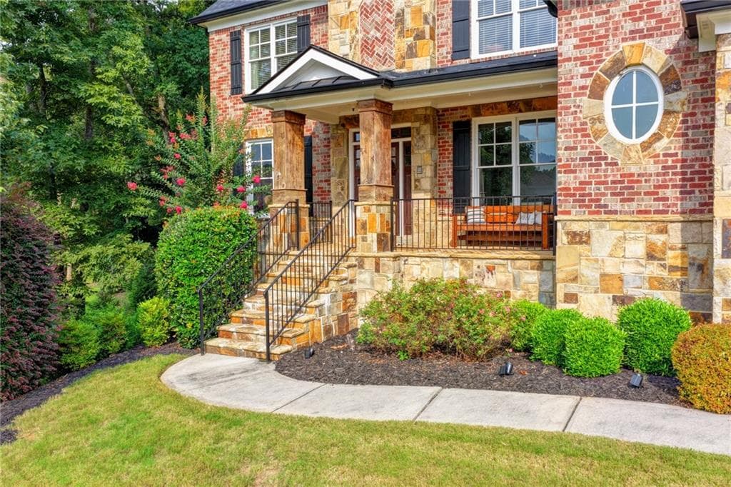 6 bedroom, 5 bathroom, 4,935 sq ft single family residence for sale at 1349 Woodtrace Lane, Auburn, GA 30011 — photo 3