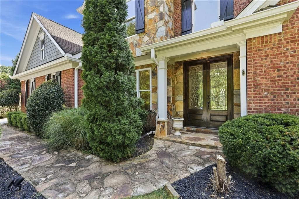 5 bedroom, 4 bathroom, 3,188 sq ft single family residence for sale at 1335 Whisper Cove Drive, Buford, GA 30518