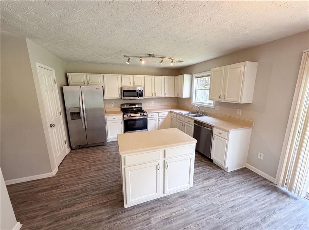 3 bedroom, 3 bathroom, 1,712 sq ft single family residence for sale at 4636 Pine Acre Circle, Buford, GA 30518 — photo 2