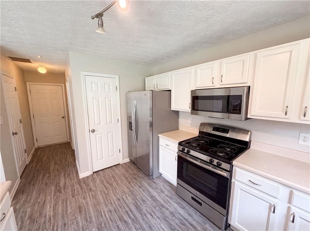3 bedroom, 3 bathroom, 1,712 sq ft single family residence for sale at 4636 Pine Acre Circle, Buford, GA 30518 — photo 7