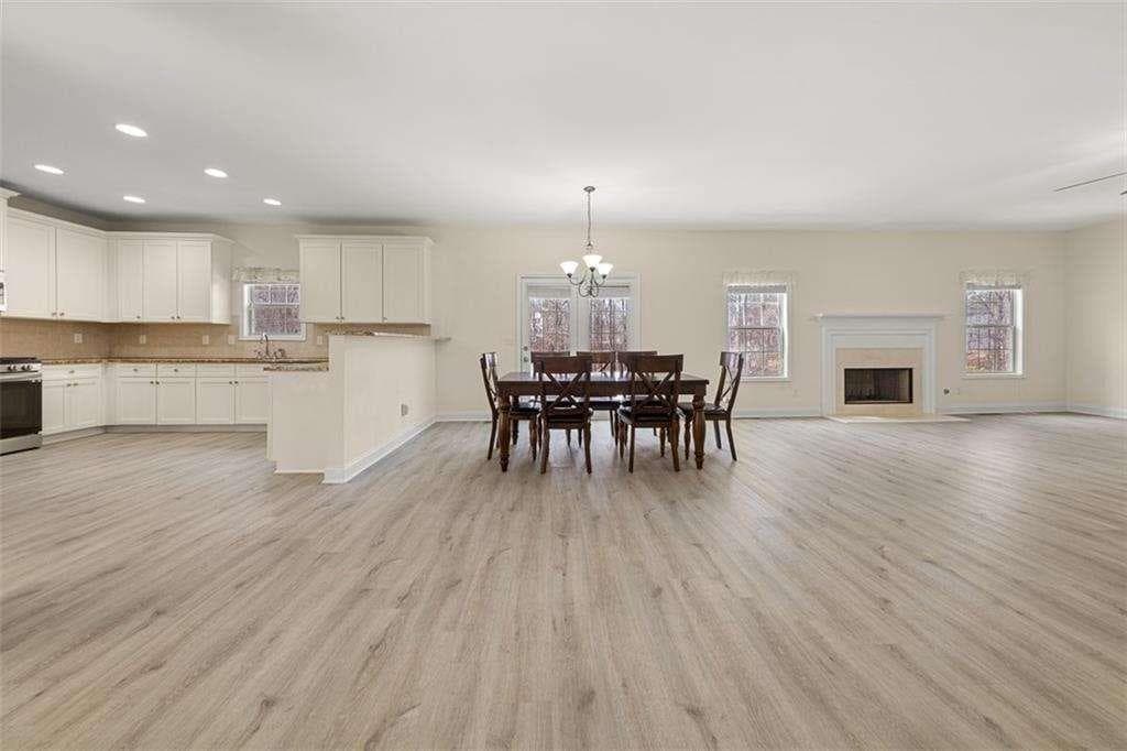 4 bedroom, 3 bathroom, 4,658 sq ft single family residence for sale at 1300 Primrose Park Road, Sugar Hill, GA 30518 — photo 8