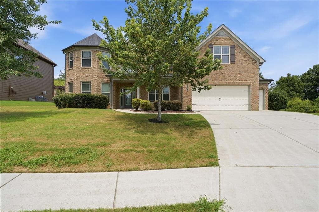 5 bedroom, 4 bathroom, 3,956 sq ft single family residence for sale at 1283 Skipping Stone Court, Dacula, GA 30019 — photo 3